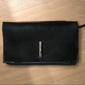 Black pony hair and grained leather clutch